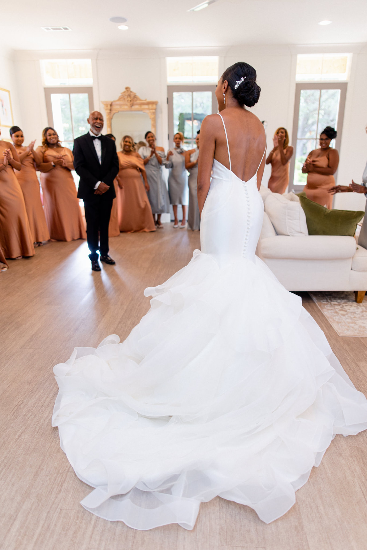 Takesha entering the room as her father and wedding party react